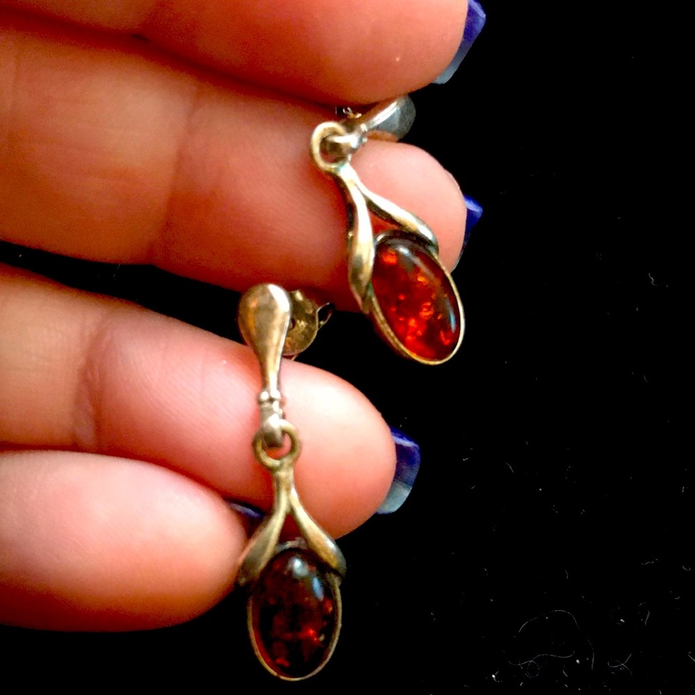 Silver earrings with pretty redish stone
